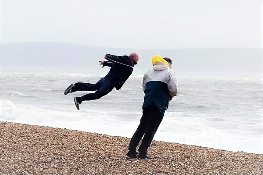 Running in the wind. Strong Wind.